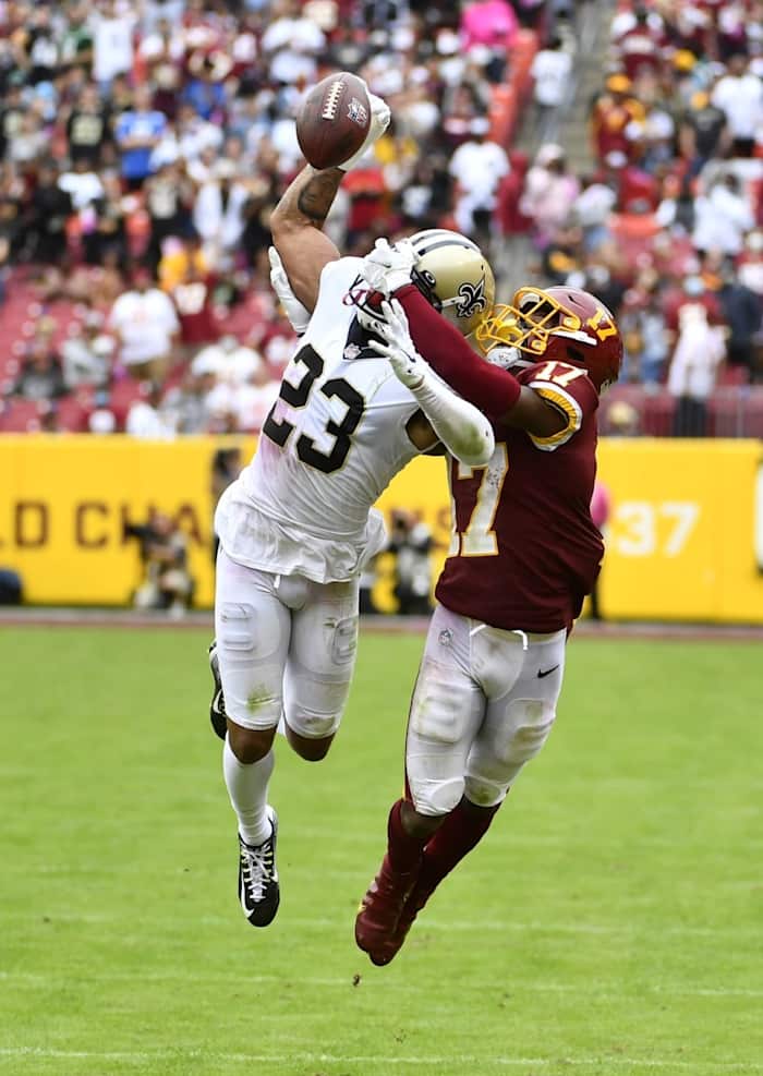 New Orleans Saints cornerback Marshon Lattimore (23) breaks up a pass intended for Washington receiver Terry McLaurin (17). Mandatory Credit: Brad Mills-USA TODAY